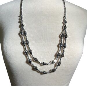 Faceted Silver Toned Beads Fashioned Into A Pull Over Style Necklace
